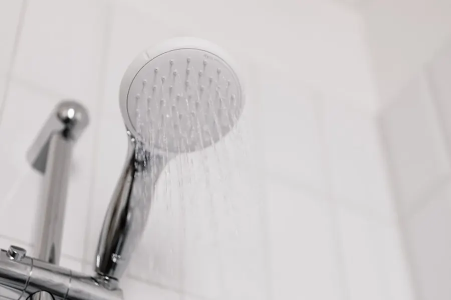 A shower head running, where limescale from hard East Devon water builds up fastest