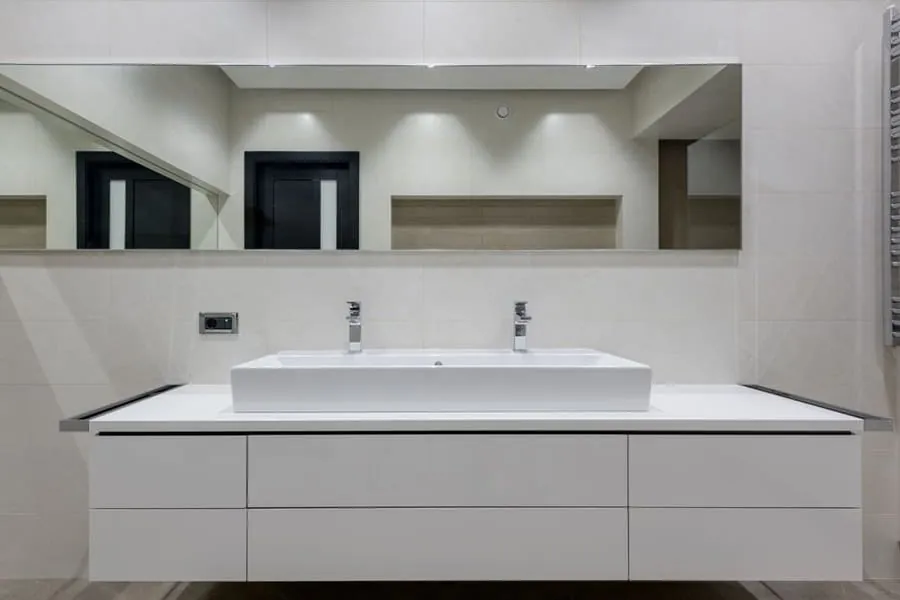 Wall-hung double vanity with twin basins in a newly installed Exeter bathroom