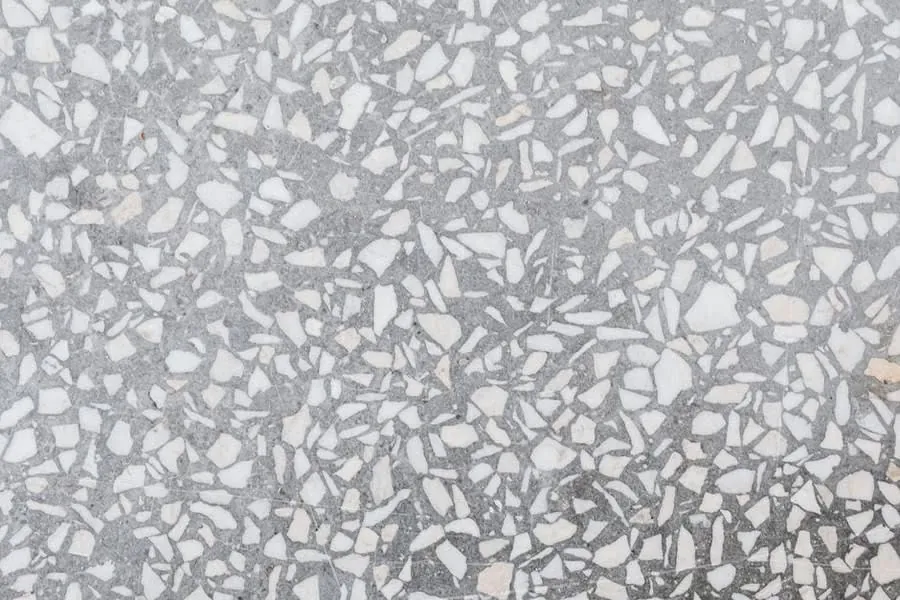 Close detail of a grey and white terrazzo surface