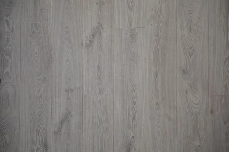 Grey wood-effect luxury vinyl tile flooring