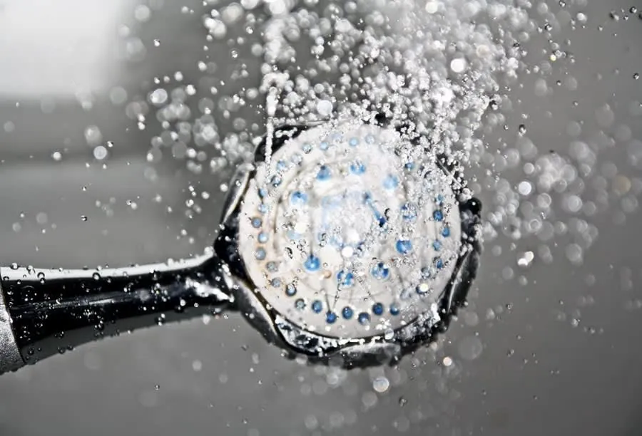Water spraying from a multi-jet shower head