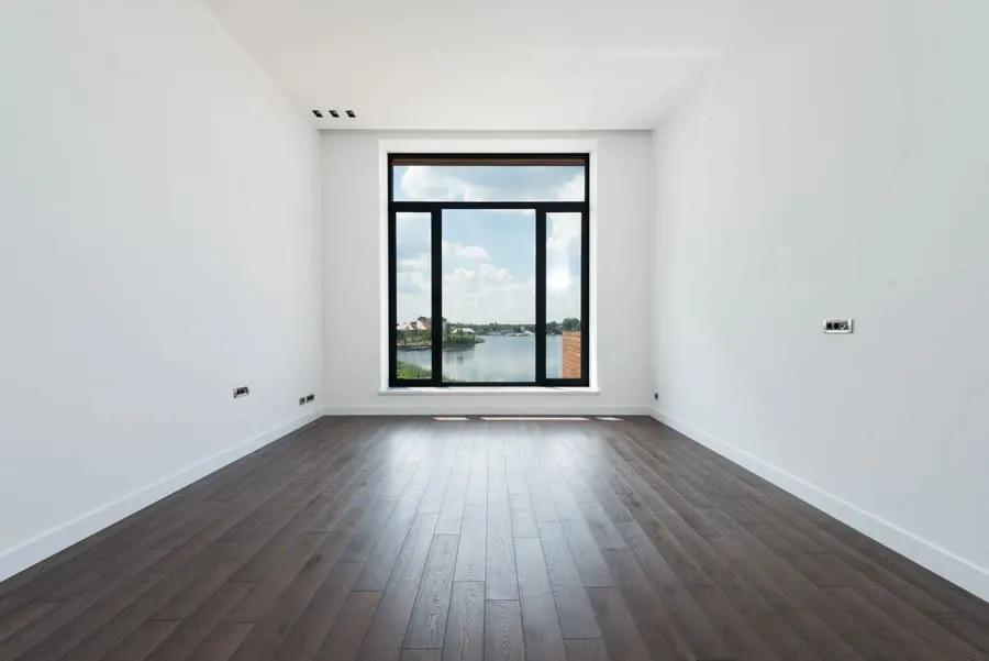 An empty room stripped back, the starting point for most bathroom relocations in an Exeter house